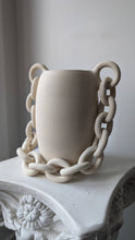 Handmade white ceramic vase with chain