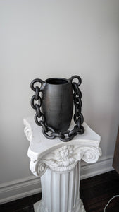 Handmade black ceramic vessel with chain