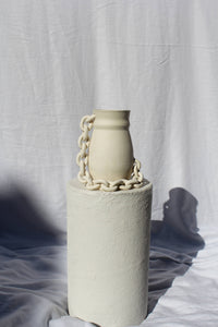 Handmade ceramic vase with chain