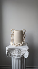 Handmade white ceramic vase with chain