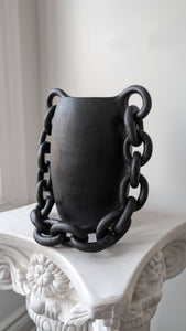 Handmade black ceramic vessel with chain