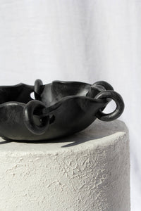 Decorative black ceramic tray with rings