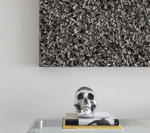 detail of artwork on a table with books